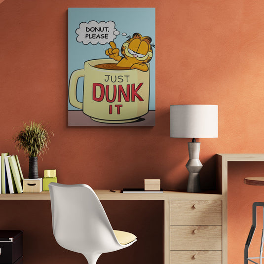 Garfield en una taza de café con el mensaje 'Just Dunk It