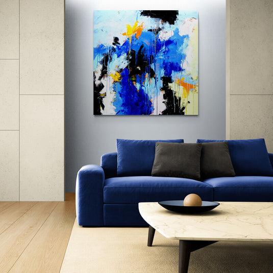 Obra de arte abstracta con combinación de colores azules, amarillos y blanco