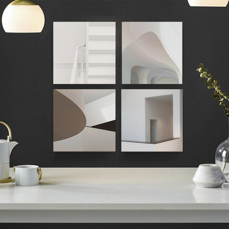 Cuatro fotografías en blanco y negro de arquitectura minimalista y juego de luces