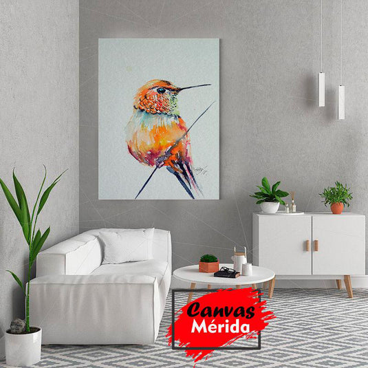 Cuadro decorativo con colibrí naranja y detalles en turquesa, verde, rojo y negro, posado en rama delgada sobre fondo claro.