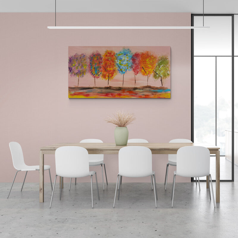 Cuadro Decorativo con Fila de Árboles de Troncos Delgados y Hojas Multicolores sobre un Fondo Rosa Pastel y Suelo Colorido