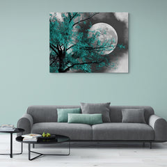 Luna llena en blanco y negro junto a árbol de hojas turquesa en cuadro decorativo.