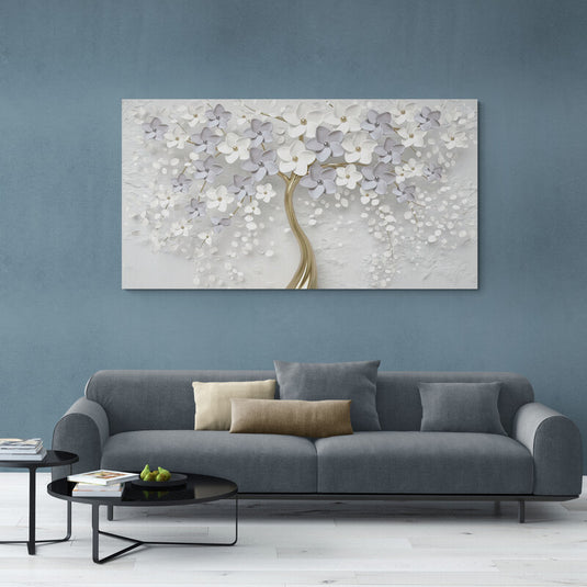 Cuadro decorativo de árbol con tronco amarillo metálico y flores blancas sobre fondo blanco y gris