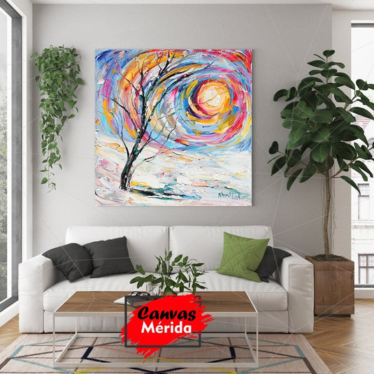 Círculo cromático en tonos rosa, azul, morado, rojo, amarillo y verde con árbol oscuro sin hojas en el centro.