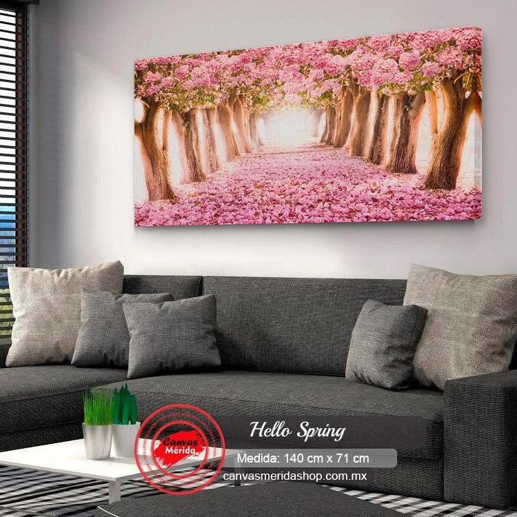 Camino otoñal flanqueado por árboles con hojas rosadas caídas en cuadro decorativo