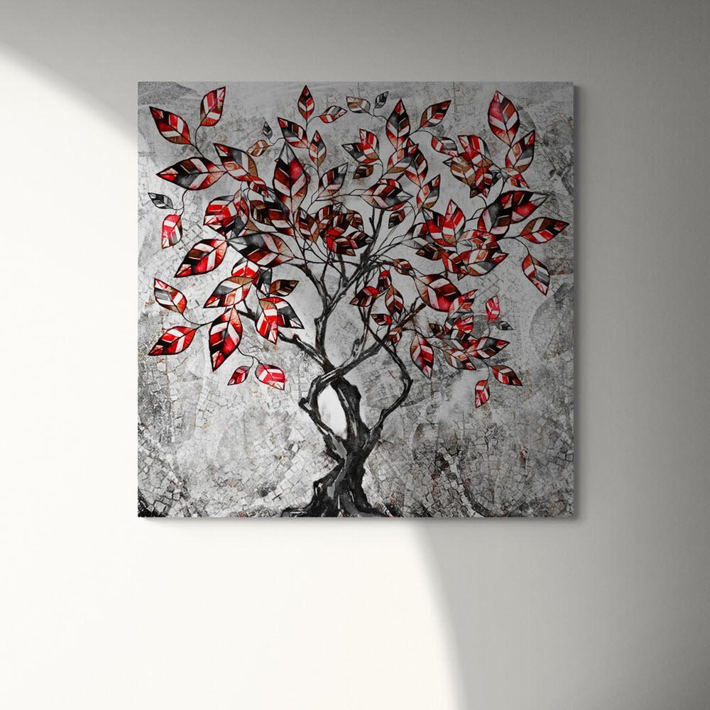 Árbol con hojas rojizas sobre fondo gris en cuadro decorativo