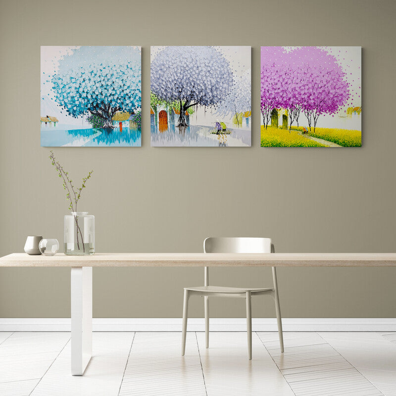 Set de cuadros decorativos: Árbol azul, árbol blanco-gris y árbol rosa.