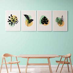 Conjunto de cuatro cuadros decorativos con hojas verdes estilizadas sobre fondos de colores pastel
