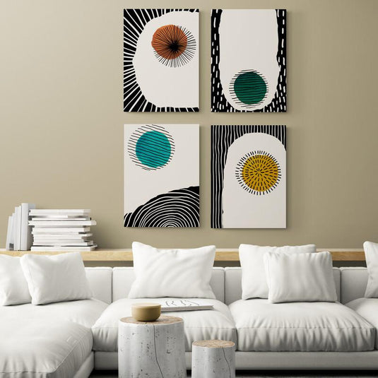 Cuadro decorativo con fondo blanco, diseños negros y círculos en esmeralda, amarillo y naranja
