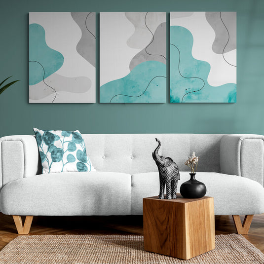 Set de cuadros abstractos con tonalidades turquesa y trazos negros fluidos