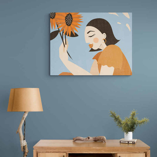 Set de cuadros decorativos con mujer en perfil, fondo azul y girasoles en mano